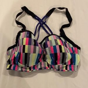 Victoria’s Secret sports bra with underwire. 34D